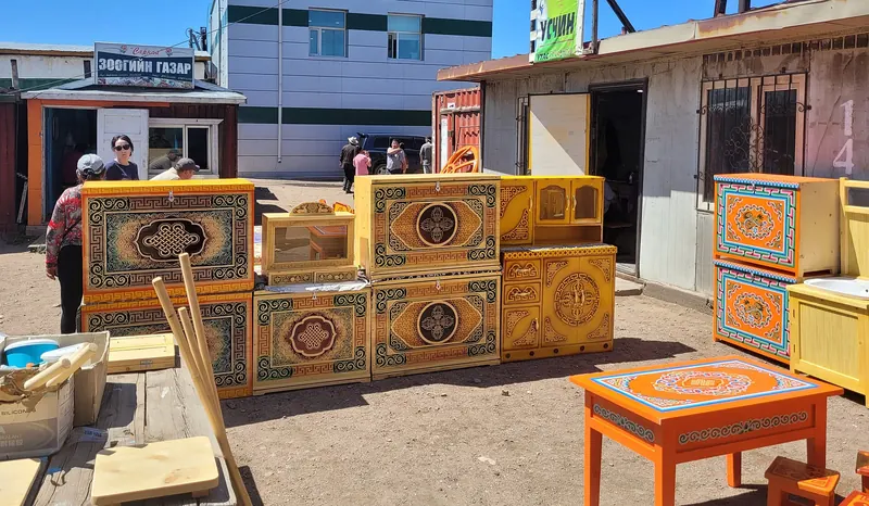Painted Mongolian chests for sale at the market in Mörön